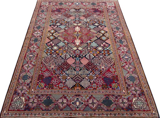Surface texture of 2000s Kashan rug with natural Wool and intricate pattern