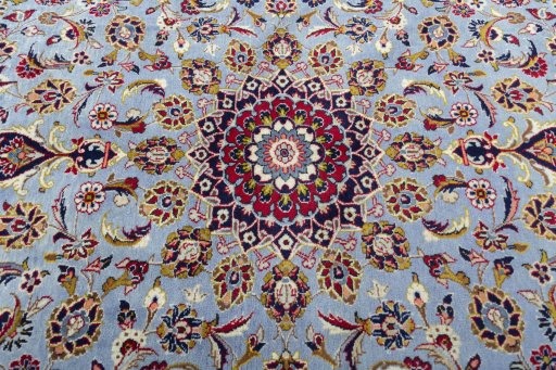 Central medallion detail of 2000s Kashan rug from Iran / Persia