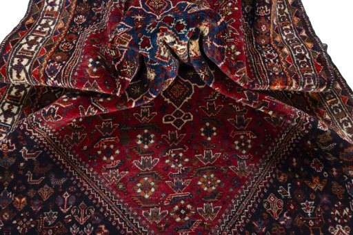 Close-up detail of 2000s Shiraz rug from Iran / Persia showing Wool weave