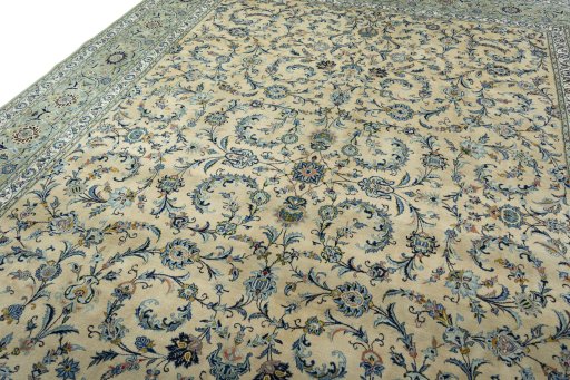 Backside of handmade 2000s Kashan rug showing knot structure and weave density