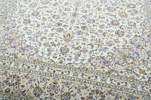Close-up detail of 2000s Kashan rug from Iran / Persia showing Wool weave