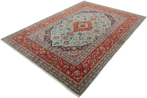 Corner detail of New Kashan rug showing border pattern and Cork pile