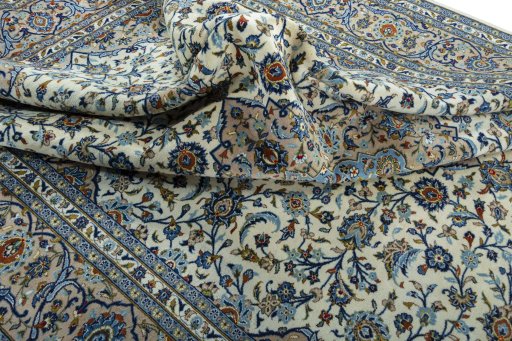 Surface texture of 2000s Kashan rug with natural Wool and intricate pattern