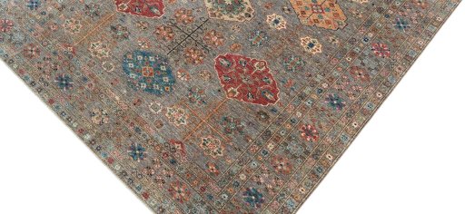 Backside of handmade New Kazak rug showing knot structure and weave density