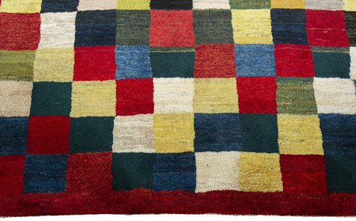 Central medallion detail of 2000s Persian Gabbeh rug from Pakistan