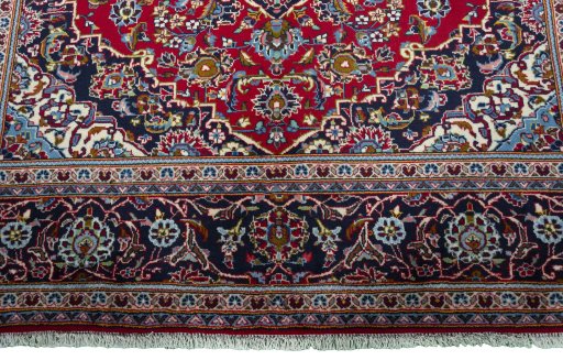 Full view of 2000s Kashan rug from Iran / Persia, 292 × 200 cm in Red tones