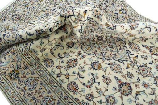 Close-up detail of 2000s Kashan rug from Iran / Persia showing Wool weave