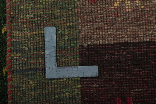 Close-up detail of 2000s Persian Gabbeh rug from Pakistan showing Wool weave