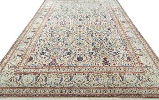 Surface texture of 1950s Kashan rug with natural Wool and intricate pattern