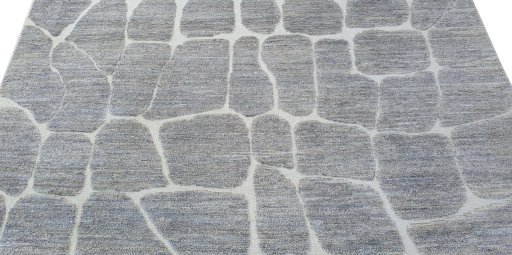 Backside of handmade New Morocco rug showing knot structure and weave density