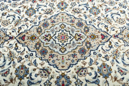 Central medallion detail of 2000s Kashan rug from Iran / Persia