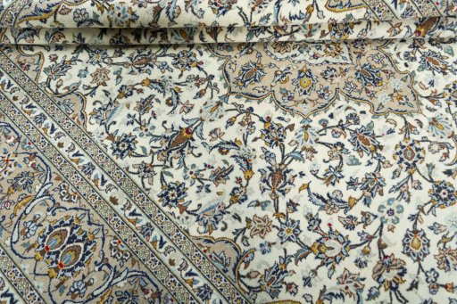 Close-up detail of 2000s Kashan rug from Iran / Persia showing Wool weave