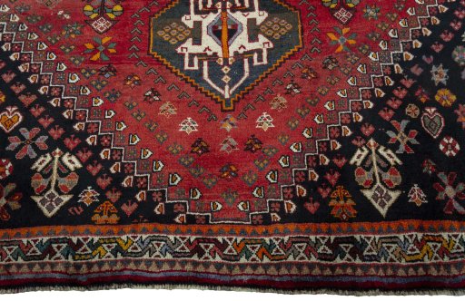 Close-up detail of 2000s Shiraz rug from Iran / Persia showing Wool weave