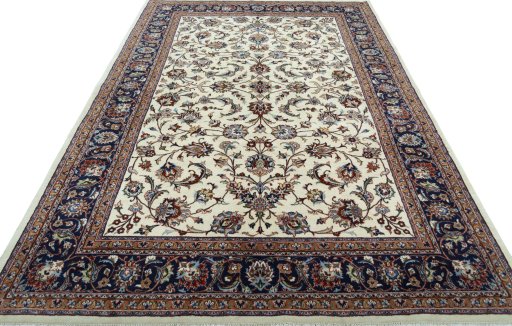 Surface texture of 2000s Mashad rug with natural Wool and intricate pattern