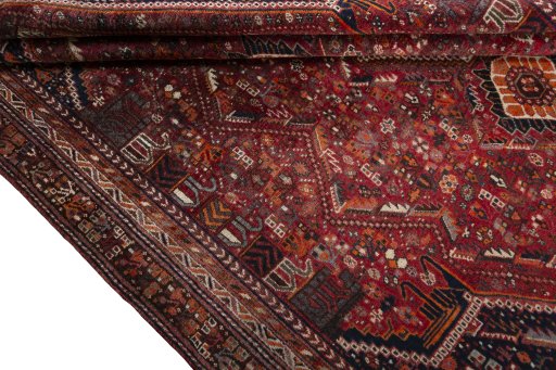 Full view of 2000s Shiraz rug from Iran / Persia, 277 × 193 cm in Red tones