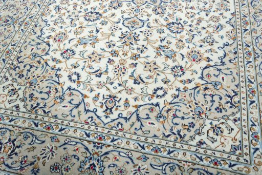 Close-up detail of 2000s Kashan rug from Iran / Persia showing Wool weave
