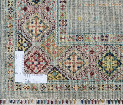 Corner detail of New Samarkand rug showing border pattern and Wool pile