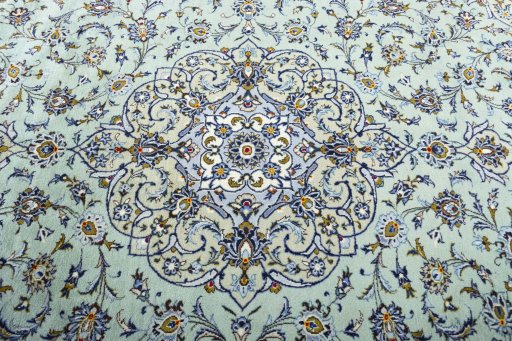 Central medallion detail of 2000s Kashan rug from Iran / Persia