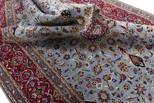 Surface texture of 2000s Kashan rug with natural Wool and intricate pattern