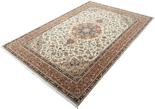 Corner detail of 2000s Tabriz 50/60/70 Raj rug showing border pattern and Cork pile