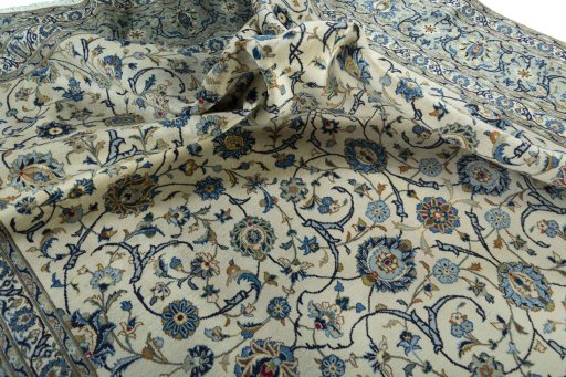 Surface texture of 2000s Kashan rug with natural Wool and intricate pattern