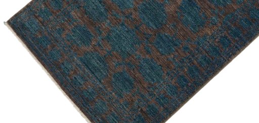 Backside of handmade New Farahan rug showing knot structure and weave density