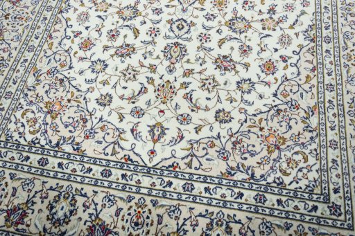 Close-up detail of 2000s Kashan rug from Iran / Persia showing Wool weave