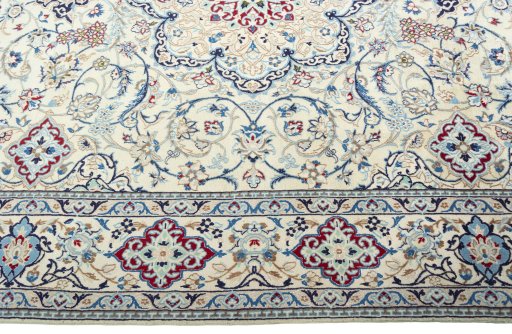 Corner detail of 2000s Nain rug showing border pattern and Wool pile