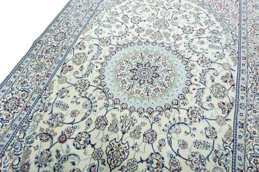 Backside of handmade 2000s Nain rug showing knot structure and weave density