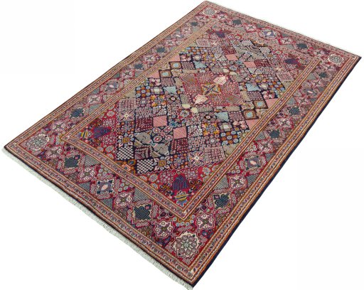 Corner detail of 2000s Kashan rug showing border pattern and Wool pile