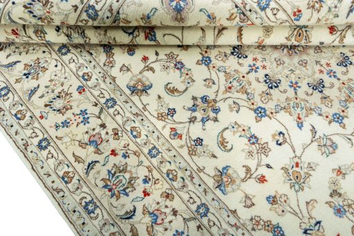 Close-up detail of New Kashan rug from Iran / Persia showing Wool weave