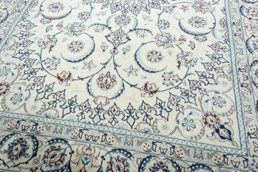 Close-up detail of 2000s Nain rug from Iran / Persia showing Wool weave