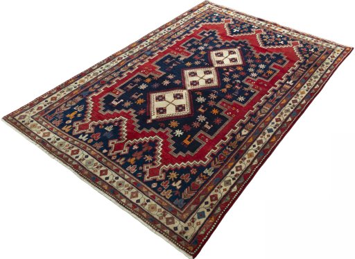 Corner detail of 2000s Sirjan rug showing border pattern and Wool pile