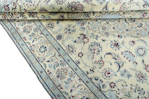 Close-up detail of 2000s Nain rug from Iran / Persia showing Wool weave