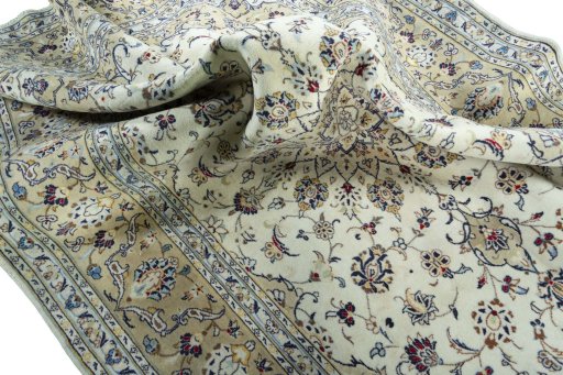 Surface texture of 2000s Kashan rug with natural Wool and intricate pattern
