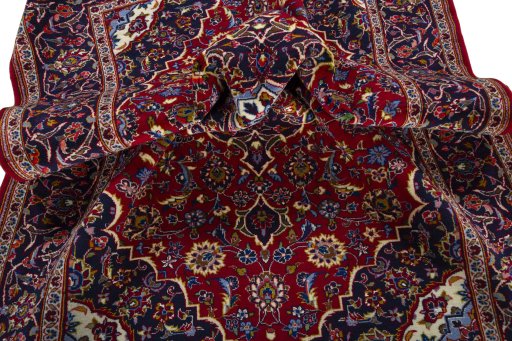 Close-up detail of 2000s Kashan rug from Iran / Persia showing Wool weave