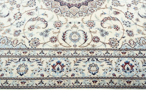 Corner detail of New Nain rug showing border pattern and Wool pile