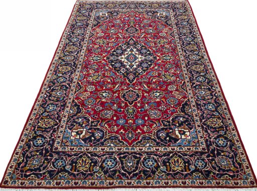 Surface texture of 2000s Kashan rug with natural Wool and intricate pattern