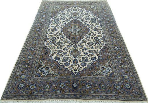 Surface texture of 2000s Kashan rug with natural Wool and intricate pattern