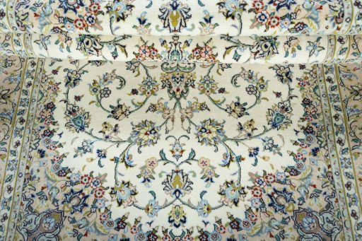 Close-up detail of New Kashan rug from Iran / Persia showing Wool weave