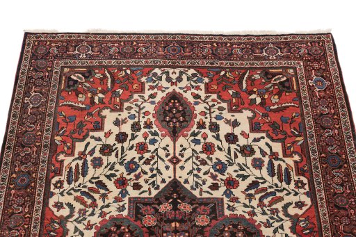 Surface texture of 1900s Farahan rug with natural Wool and intricate pattern