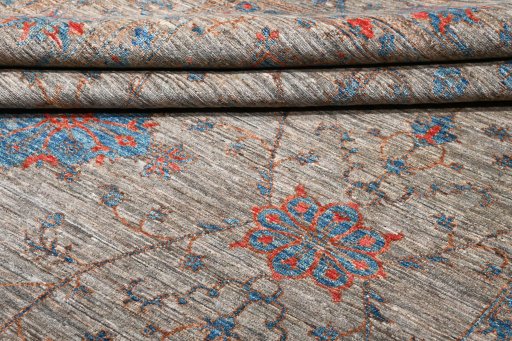 Backside of handmade New Farahan rug showing knot structure and weave density