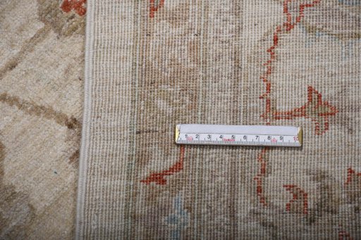 Backside of handmade New Farahan rug showing knot structure and weave density