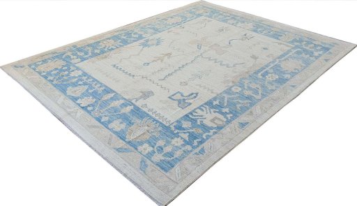 Backside of handmade New Farahan rug showing knot structure and weave density