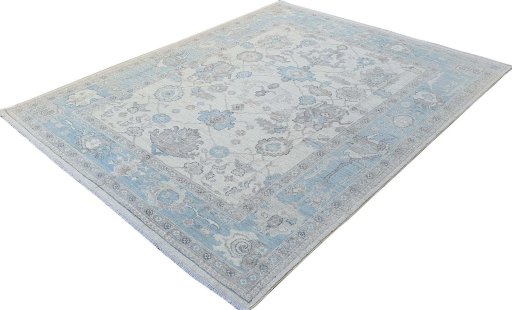 Backside of handmade New Farahan rug showing knot structure and weave density