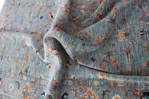 Backside of handmade New Farahan rug showing knot structure and weave density