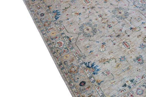 Backside of handmade New Farahan rug showing knot structure and weave density