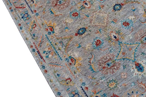 Backside of handmade New Farahan rug showing knot structure and weave density