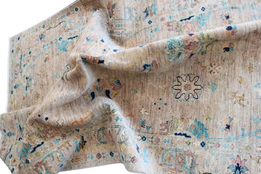 Backside of handmade New Farahan rug showing knot structure and weave density