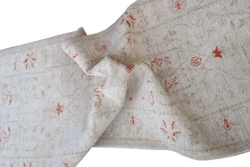 Backside of handmade New Farahan rug showing knot structure and weave density